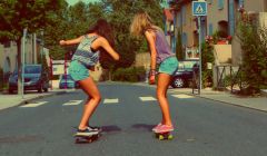 Boarding down the streets with sophie and elise.