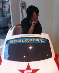 Driving the car.